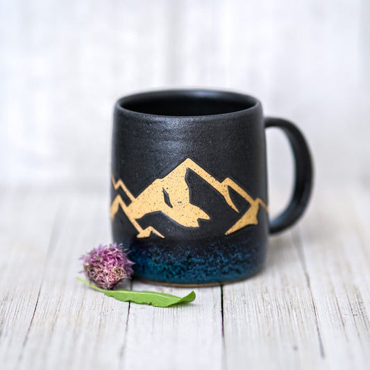 Black mountain with deep blue strip